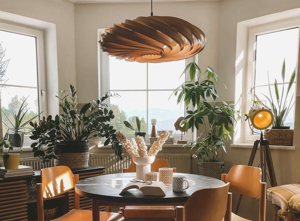 Wooden hanging lamp above the dining table
